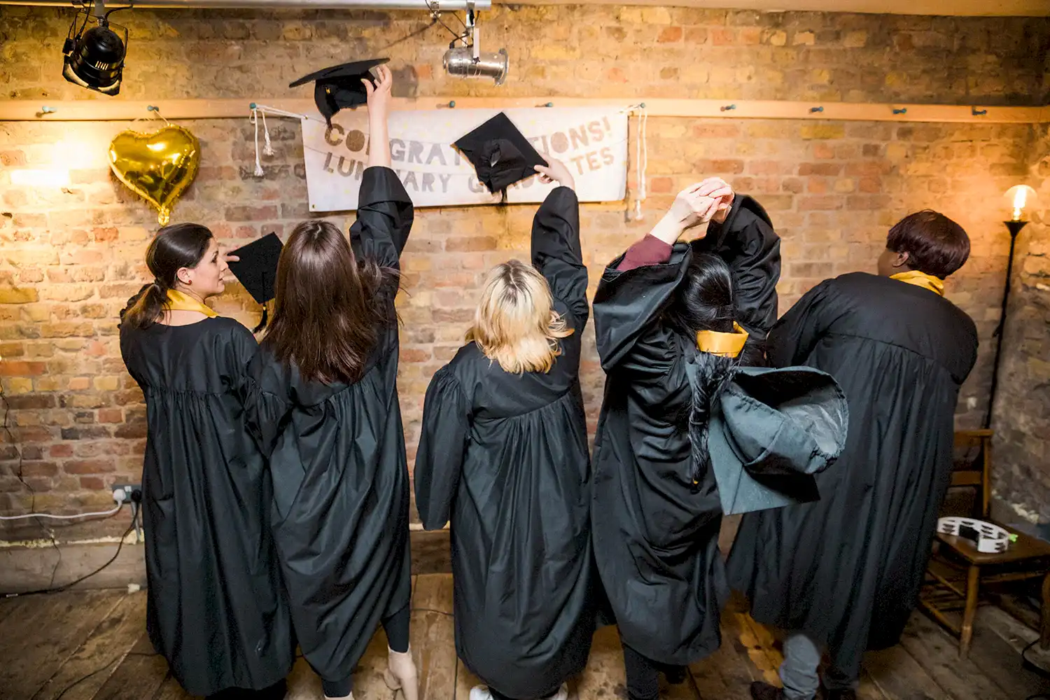 Graduates Throwing Hats